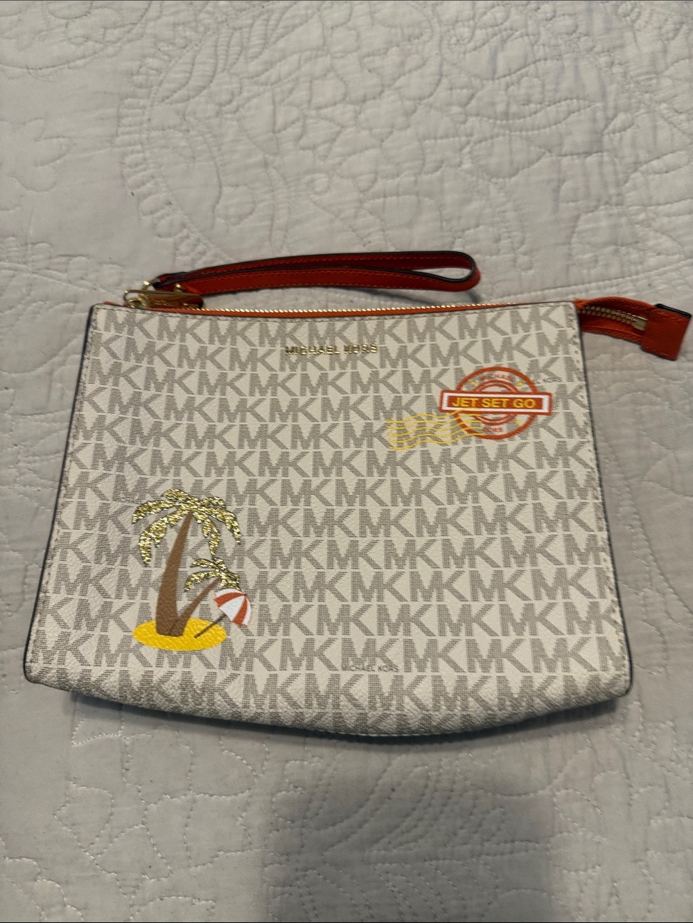 Michael Kors Signature MK Canvas Wristlet in Vanilla with Orange Trim